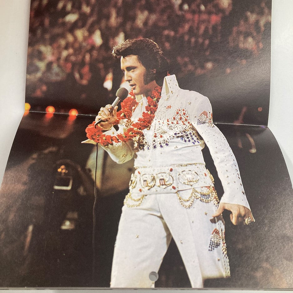 Internal page of the VTG 1978 Elvis Presley Color Calendar showcasing Elvis performing in a sequined white jumpsuit.