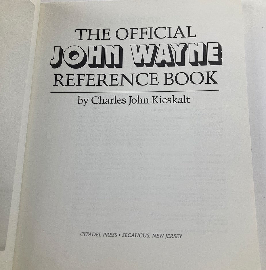 Inside page of '1985 The Official John Wayne Reference Book by Charles John Kieskalt' featuring the title and citation details.