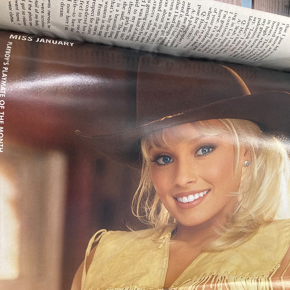 Image of Playboy Magazine January 1999 featuring Miss January Jaime Bergman in a cowboy hat and vintage attire, showcasing her captivating smile and charm ideal for collectors.