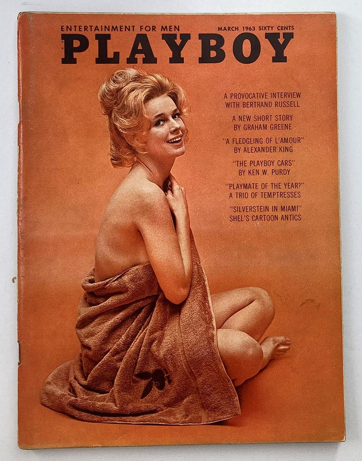 VTG Playboy Magazine March 1963 cover featuring Adrienne Moreau, highlighting vintage glamour and classic photography.