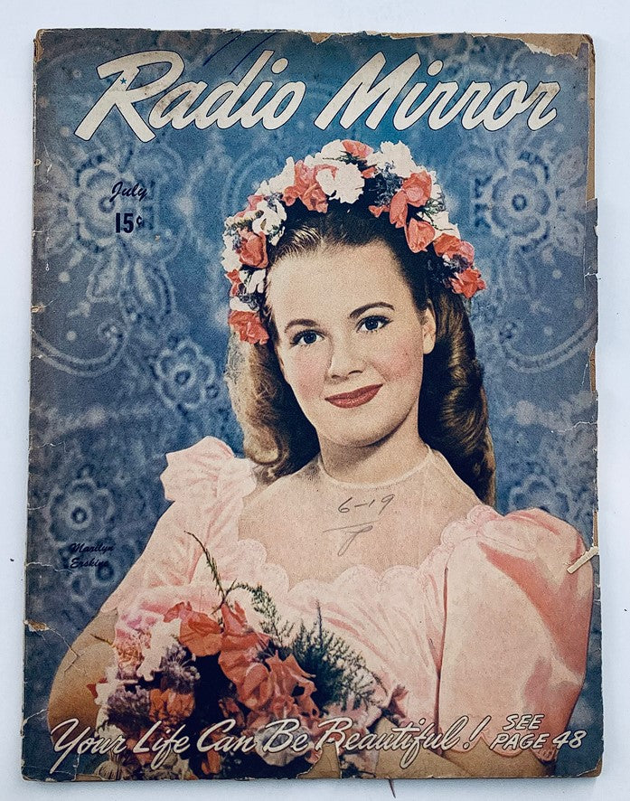 Cover of VTG Radio Mirror Magazine July 1946 featuring Marilyn Erskine surrounded by flowers, showcasing vintage design elements and mid-20th century fashion.