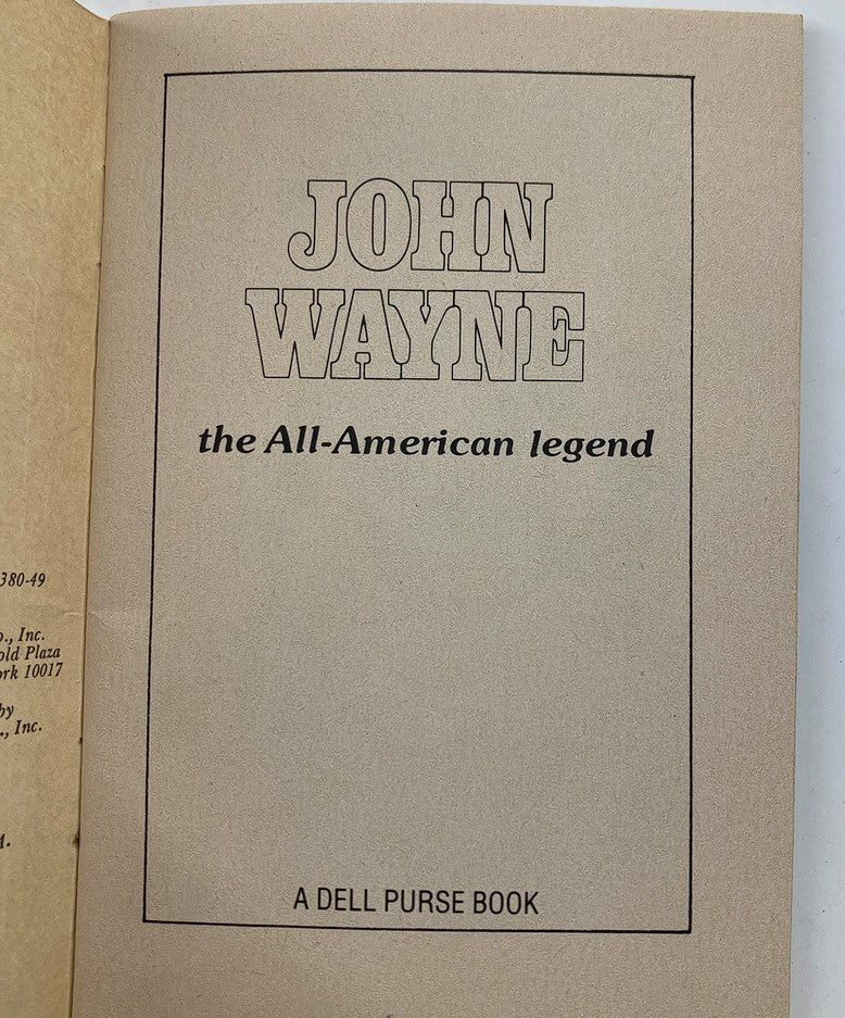 Title page of VTG 1979 John Wayne The All-American Legend A Dell Purse Book displaying the title and publisher information.