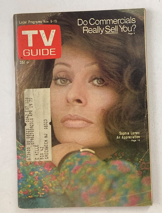 Cover of TV Guide Magazine November 9 1974 Issue #1128 featuring iconic actress Sophia Loren. The magazine includes the title 'Do Commercials Really Sell You?' and showcases a striking image of Loren, reflecting the style and aesthetics of 1970s television.