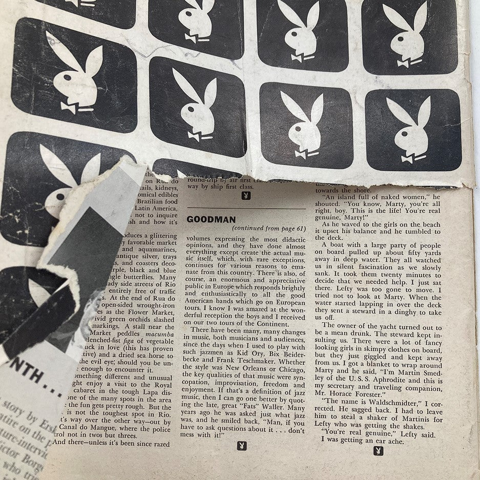 Close-up view of the interior page from the April 1956 issue of Playboy Magazine featuring multiple iconic Playboy bunny logos and text content, relating to the articles in the magazine and showcasing the historical significance of this issue with Playmate Rusty Fisher.