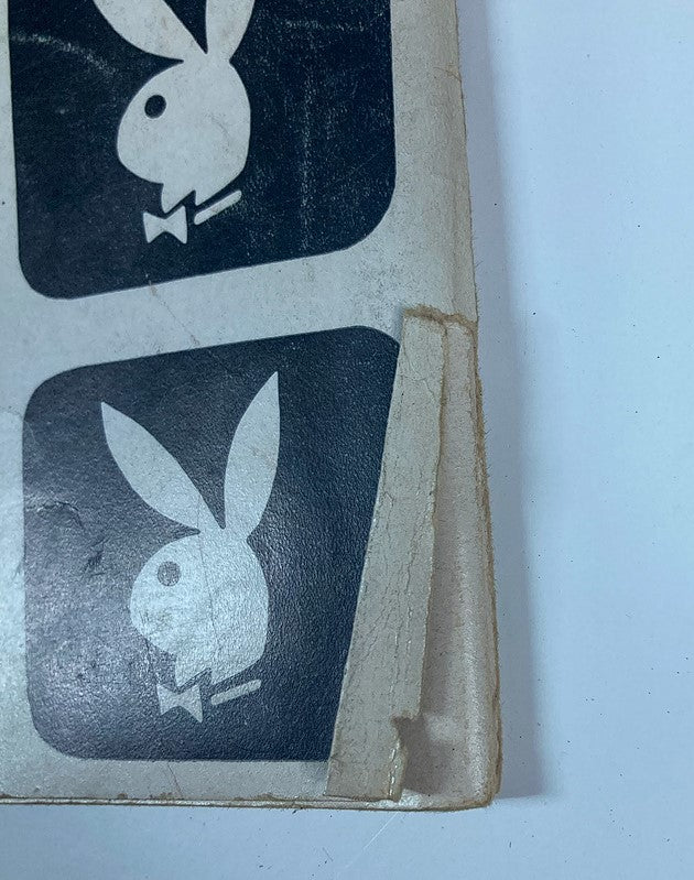Close-up of the vintage Playboy magazine from April 1956, showcasing the iconic Playboy logo with slight damage to the edge, related to the VTG Playboy Magazine April 1956 Playmate Rusty Fisher w Centerfold.