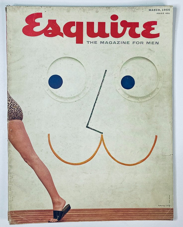 Cover of VTG Esquire Magazine March 1955 No. 256 featuring a minimalist design with large eyes and a playful face motif, emphasizing the theme of masculine identity and culture.