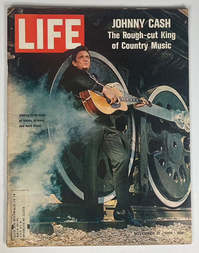 Cover of VTG Life Magazine November 21, 1969 featuring Johnny Cash, The Rough-Cut King of Country Music, with a dramatic background of train wheels and smoky atmosphere.