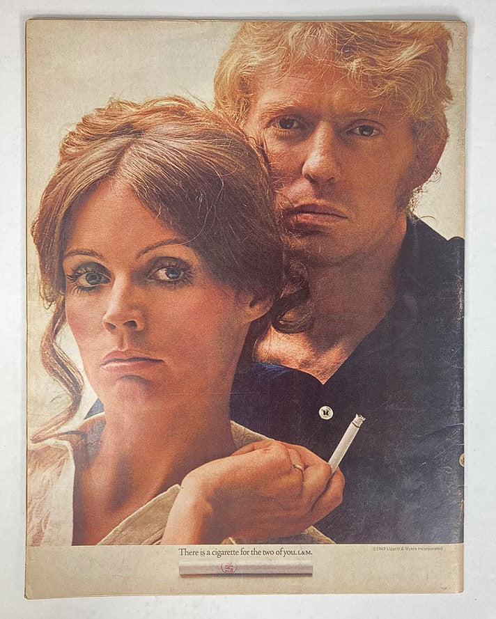 Advertisement in Life Magazine from November 7, 1969, showcasing a couple with expressions of contemplation, with the caption about sharing a cigarette.