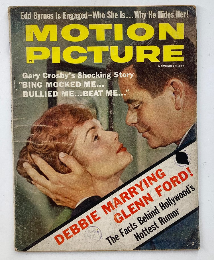Cover of VTG Motion Picture Magazine from November 1959 featuring Debbie Reynolds and Glenn Ford. The vibrant magazine cover highlights the headline 'DEBBIE MARRYING GLENN FORD!' alongside other articles, capturing a moment from classic Hollywood.
