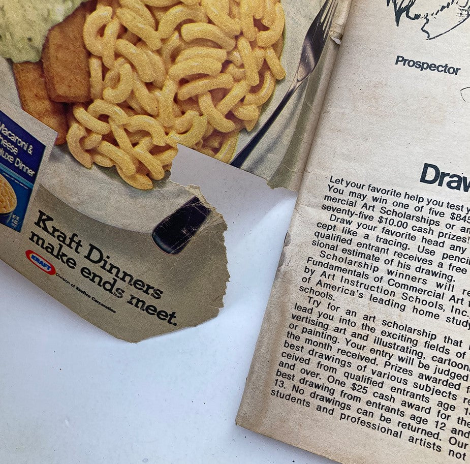 Advertisement page from TV Guide Magazine February 28, 1976, Issue #1196 featuring Kraft Dinner promotion and an art scholarship drawing contest.
