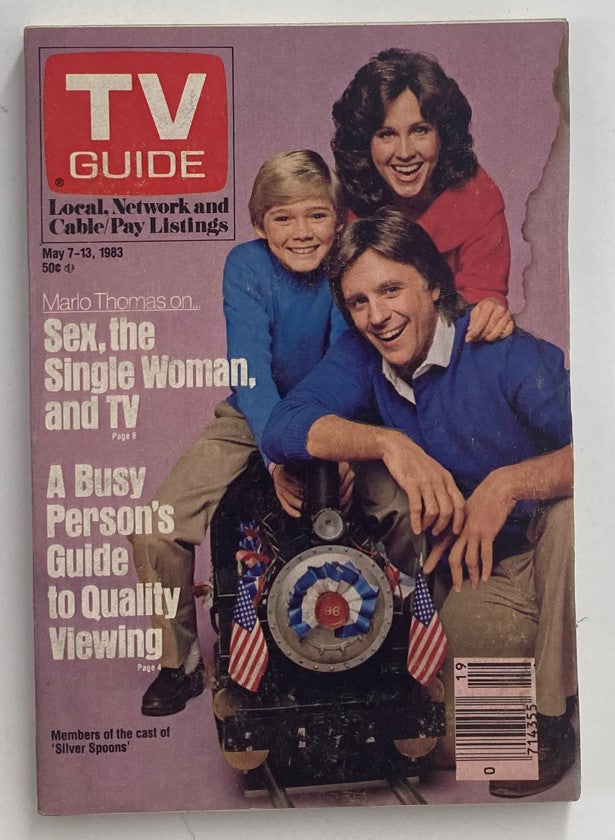 Vintage TV Guide Magazine cover dated May 7, 1983, featuring Marlo Thomas with actors and a train, highlighting popular TV shows and cultural insights from the early 1980s.