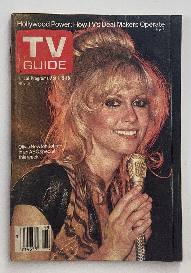 TV Guide Magazine April 12, 1980 featuring Olivia Newton-John on the cover, showcasing her with a microphone, capturing the pop culture essence of the era.