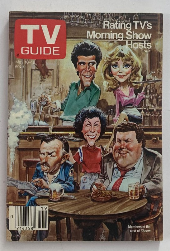 Vintage TV Guide Magazine from May 10, 1986, featuring a caricature of the cast of Cheers at a bar. This collectible cover highlights the iconic sitcom during its peak popularity.