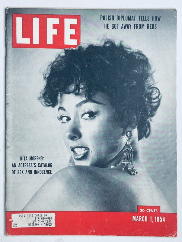 VTG Life Magazine March 1 1954 featuring Rita Moreno on the cover, showcasing her captivating portrayal as an actress alongside a Polish diplomat, reflecting the blend of politics and culture in the 1950s.