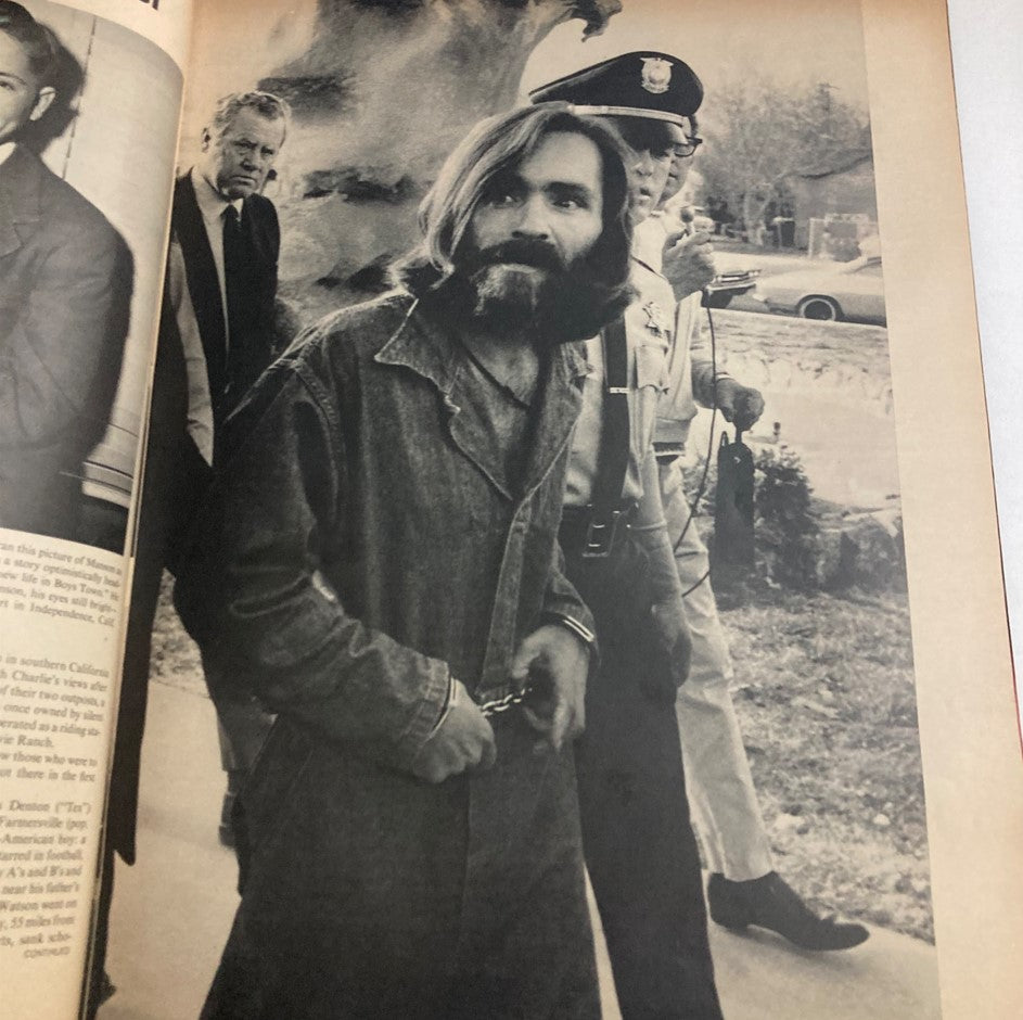 Image from VTG Life Magazine December 19 1969 showing Charlie Manson in custody, revealing his infamous connection to violent crimes.