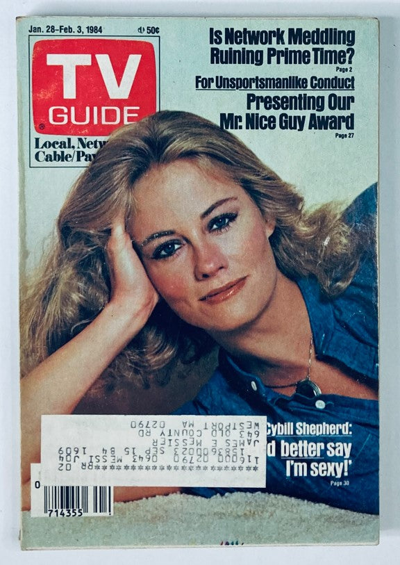 TV Guide Magazine January 28 1984 featuring Cybill Shepherd on the cover with a vibrant image showcasing her charm and beauty. The issue discusses television topics of the era, including network meddling, as reflected on the cover.