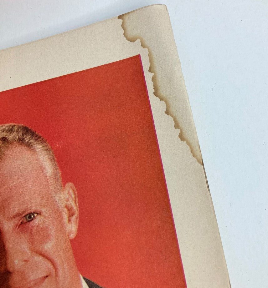 Close-up of a page from the VTG Life Magazine April 29 1957 showing age-related wear, including tears and discoloration.
