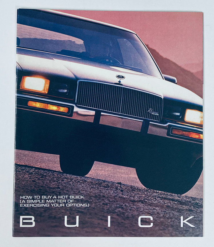 1987 Buick Dealer Showroom Sales Brochure Guide Catalog cover featuring a classic Buick car with a scenic backdrop, illustrating the allure of Buick vehicles and promoting buying options.