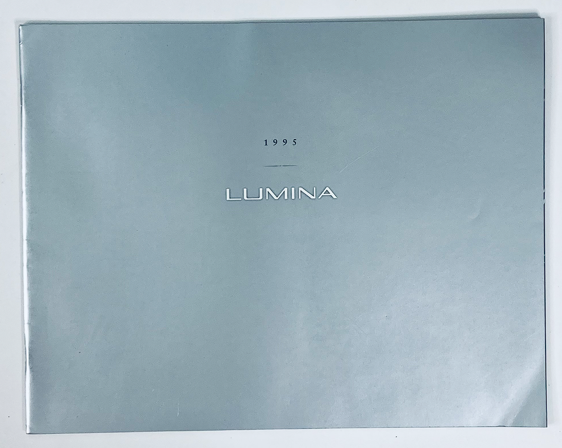 1995 Chevrolet Lumina Dealer Showroom Sales Brochure Guide Catalog cover featuring a sleek gray design with the year and model name prominently displayed.