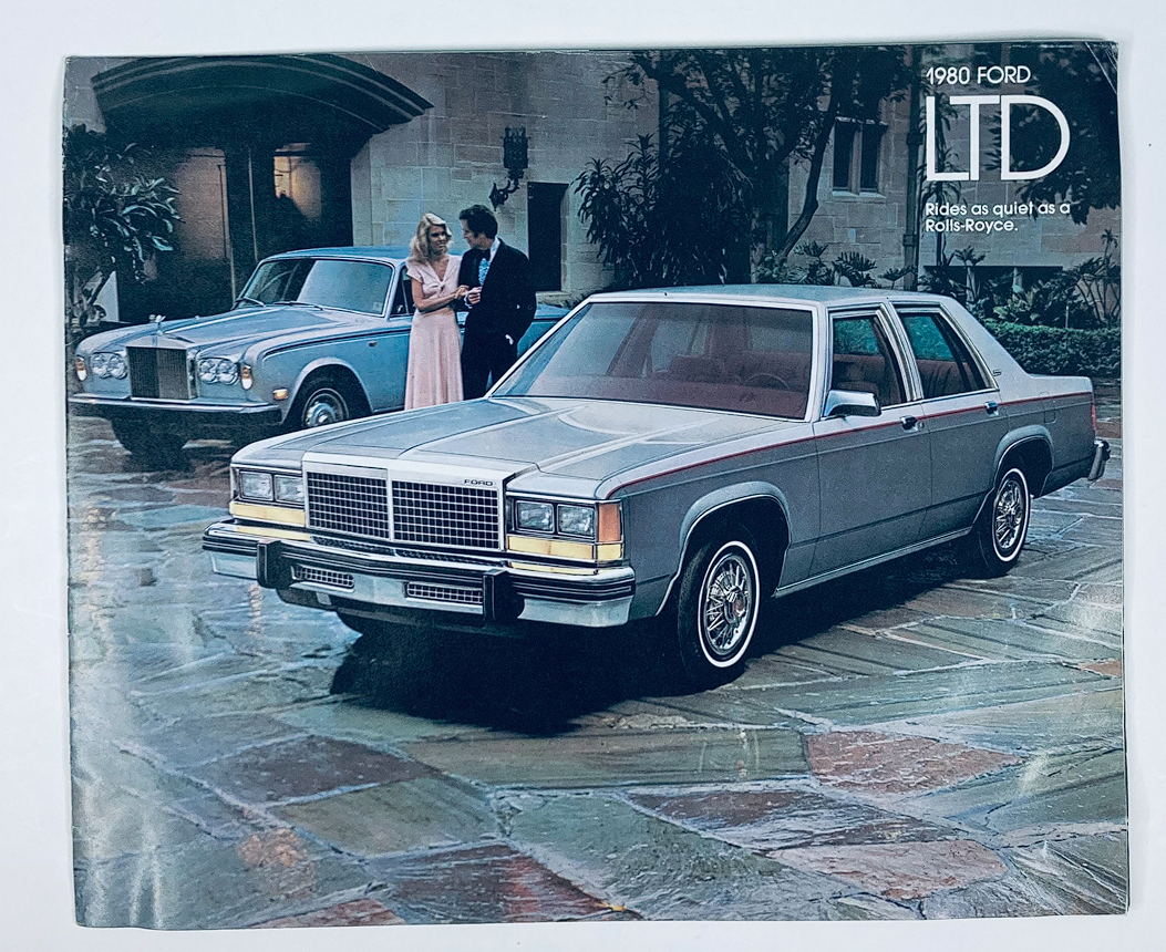 1980 Ford LTD Lineup Dealer Showroom Sales Brochure featuring a Ford LTD parked in front of a luxury car, showcasing its elegant design and vibrant setting, capturing the essence of automotive marketing from the 80s.