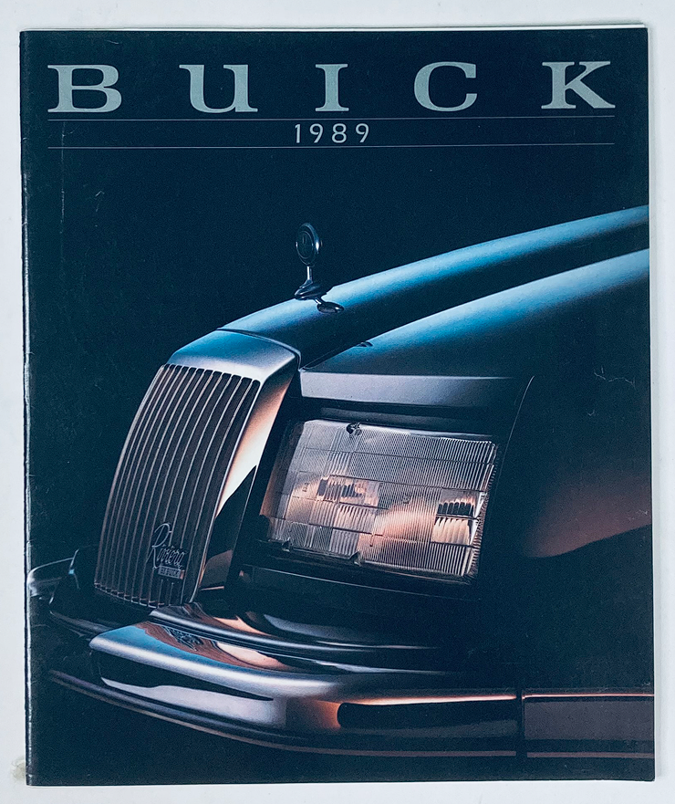 Cover of the 1989 Buick Dealer Showroom Sales Brochure Guide Catalog featuring a close-up view of a Buick car's front grille and headlight, emphasizing the vehicle's sleek design and classic style.