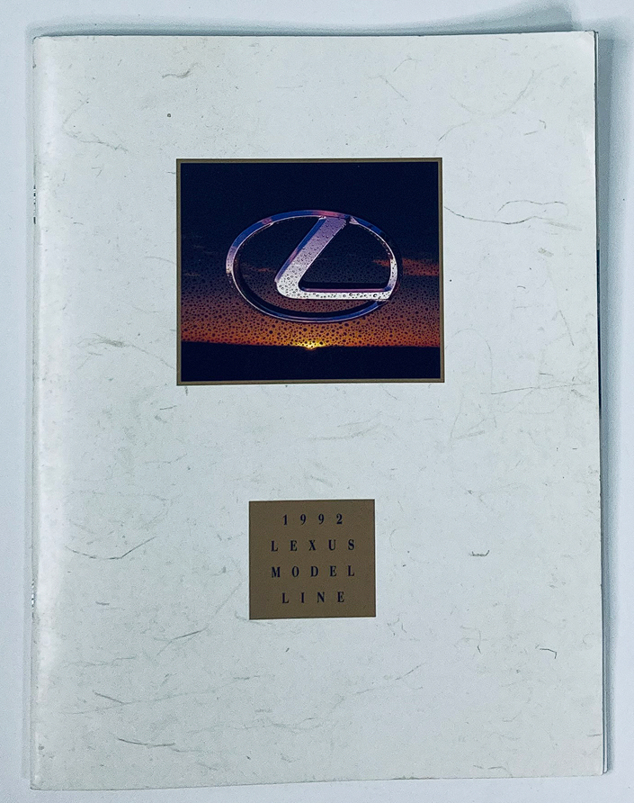 1992 Lexus Model Line Dealer Showroom Sales Brochure Guide Catalog cover featuring the Lexus logo against a textured background.