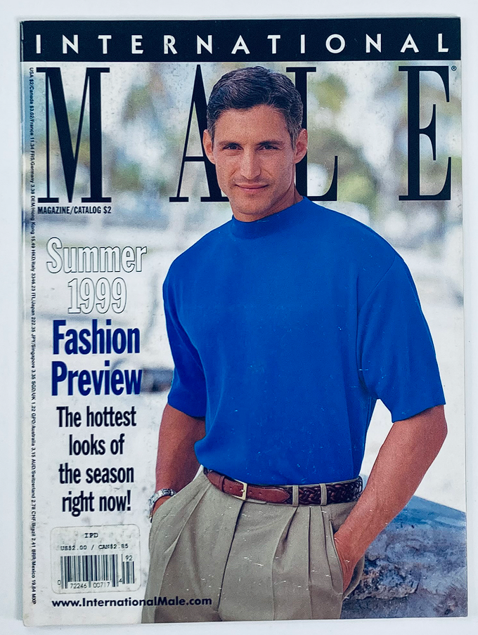 Cover of the 1999 Summer Fashion Preview International Male Magazine Catalog featuring a model in a blue shirt with a relaxed expression, highlighting summer fashion trends.