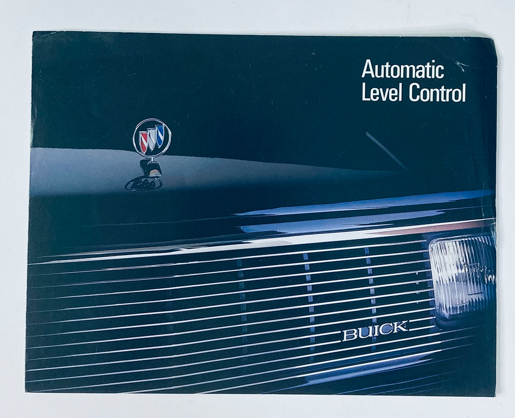 Cover of the 1987 Buick Dealer Showroom Sales Brochure showing the Buick emblem and grille, highlighting the Automatic Level Control feature. This vintage catalog offers insights into Buick's 1987 vehicle lineup.