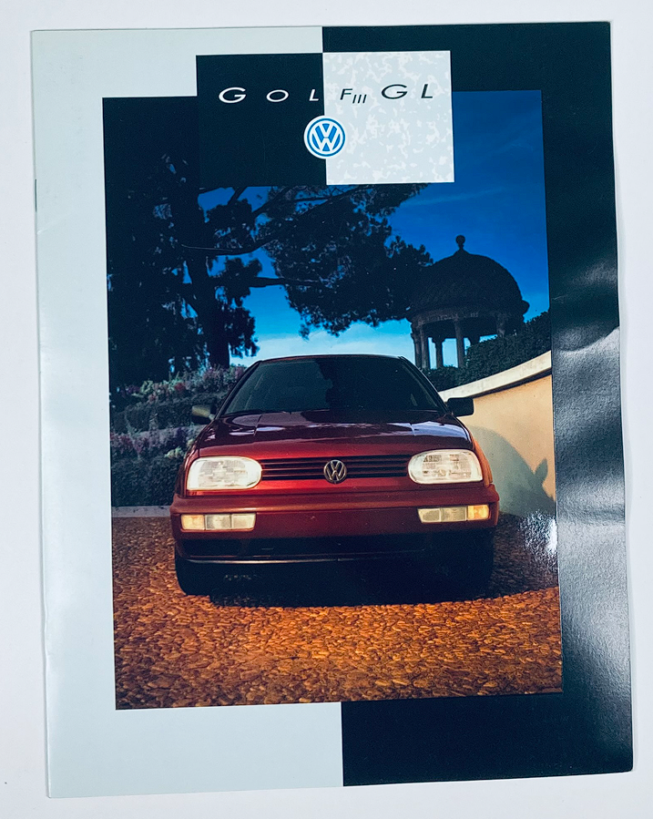 1993 Volkswagen Golf III GL Dealer Showroom Sales Brochure cover featuring a red Volkswagen Golf parked in a scenic outdoor setting.