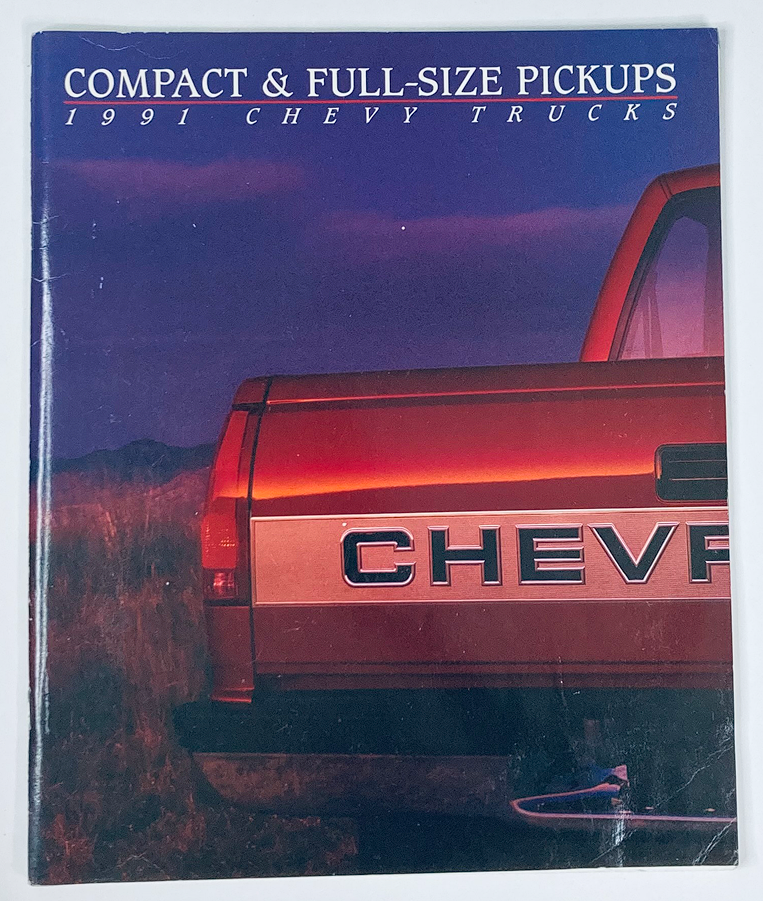 1991 Chevrolet Compact Trucks Dealer Showroom Sales Brochure Guide Catalog featuring a rear view of a Chevy truck with the logo and title 'Compact & Full-Size Pickups' highlighted against a sunset background.