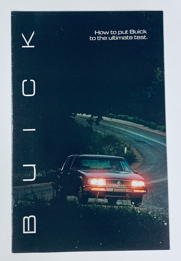 Cover of the 1986 Buick Dealer Showroom Sales Brochure Guide Catalog featuring a vintage Buick car on a winding road at night with the text, 'How to put Buick to the ultimate test.'