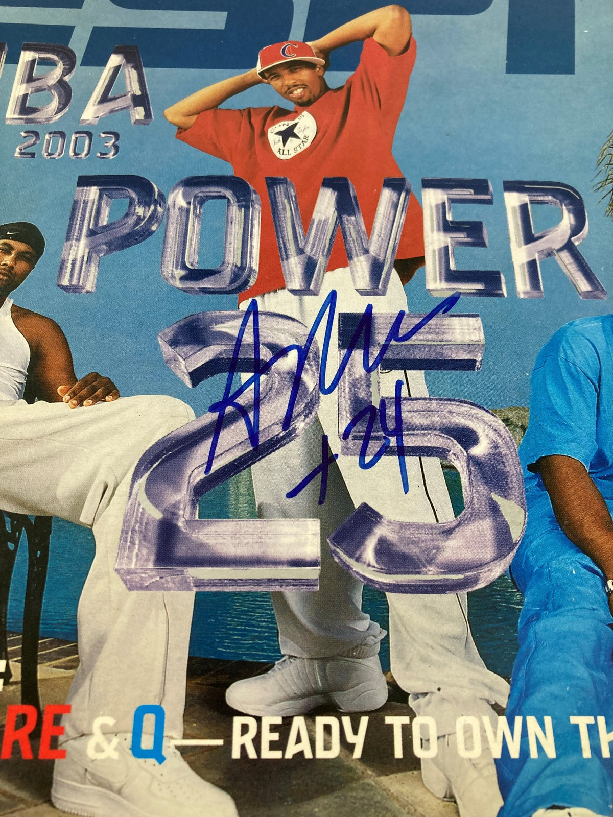 Andre Miller ESPN Magazine cover from November 11, 2002, showcasing a signed photo featuring Andre Miller in a casual outfit with a power pose, part of a vintage sports collectible.