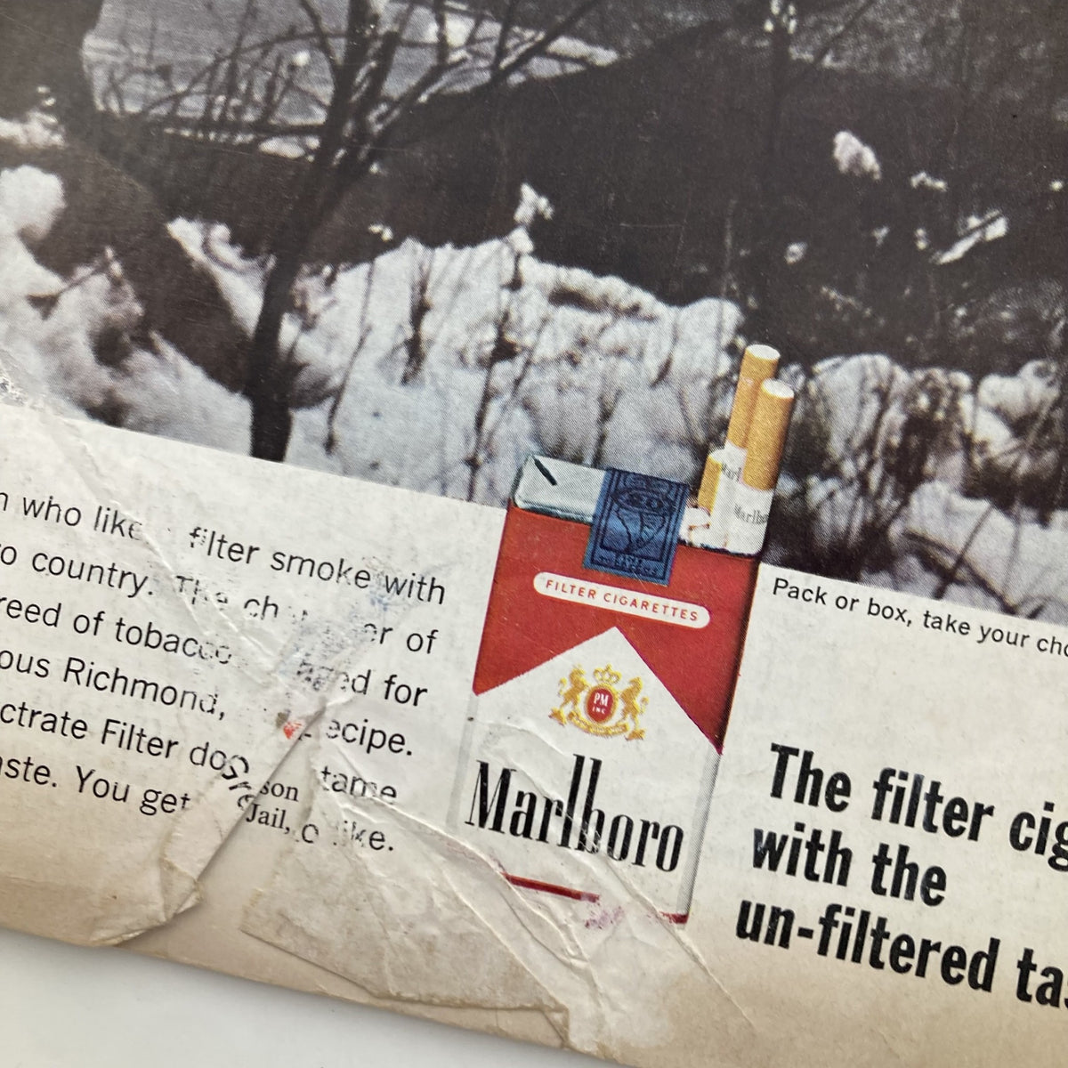 Vintage advertisement featuring Marlboro cigarettes from The Saturday Evening Post Magazine February 2, 1963, highlighting the unfiltered taste and classic branding in a historical context.