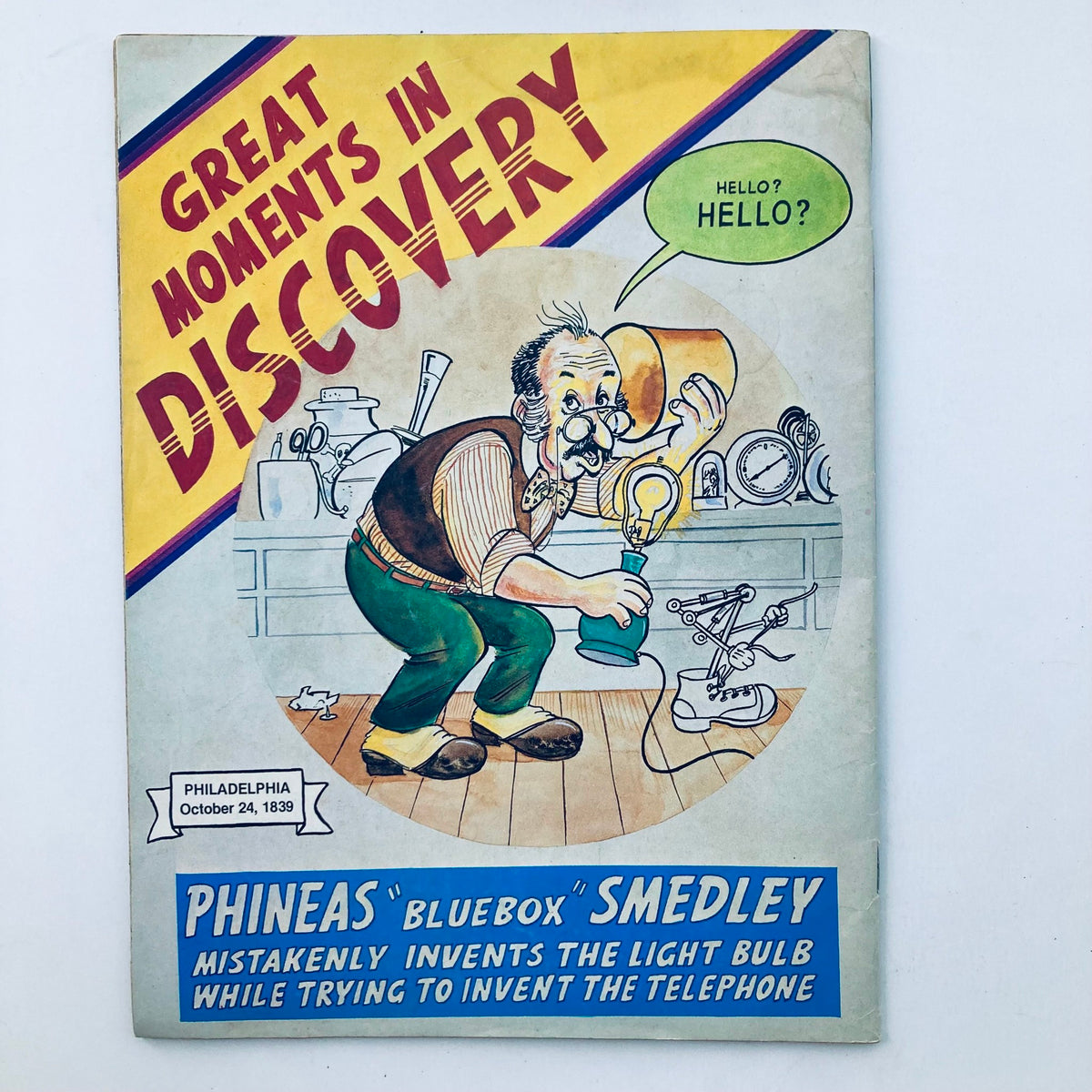 Back cover of VTG Cracked Magazine August 1985 No. 213, displaying a humorous cartoon titled 'Great Moments in Discovery', featuring an inventor character humorously interacting with light bulbs and gadgets.