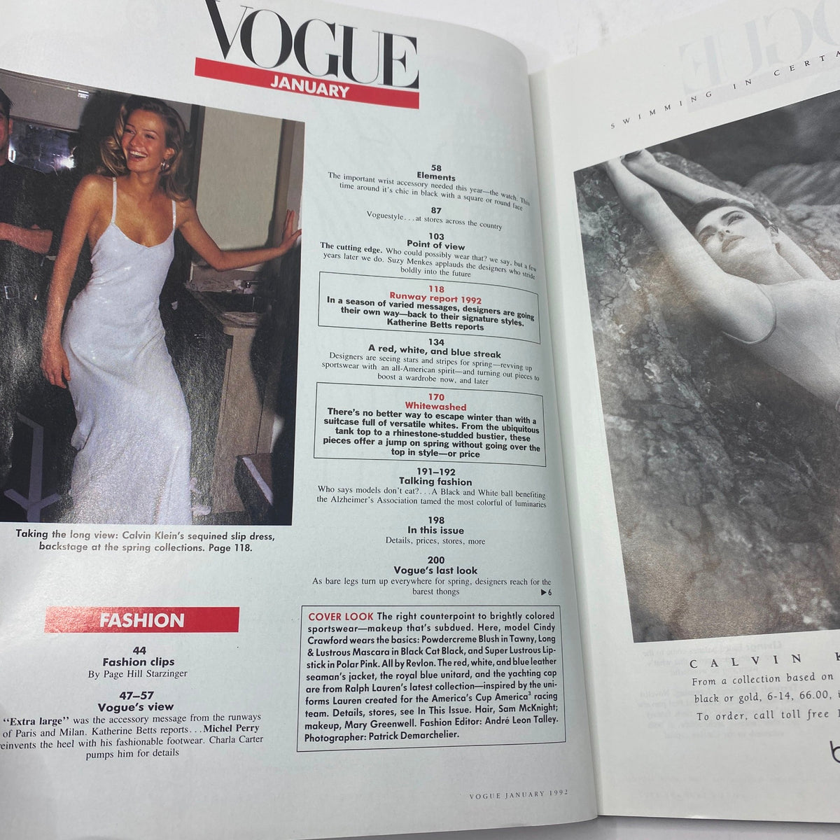 Inside page of Vogue Magazine January 1992 featuring a model wearing a Calvin Klein slip dress, showcasing fashion trends from the early '90s in a vintage magazine setting.