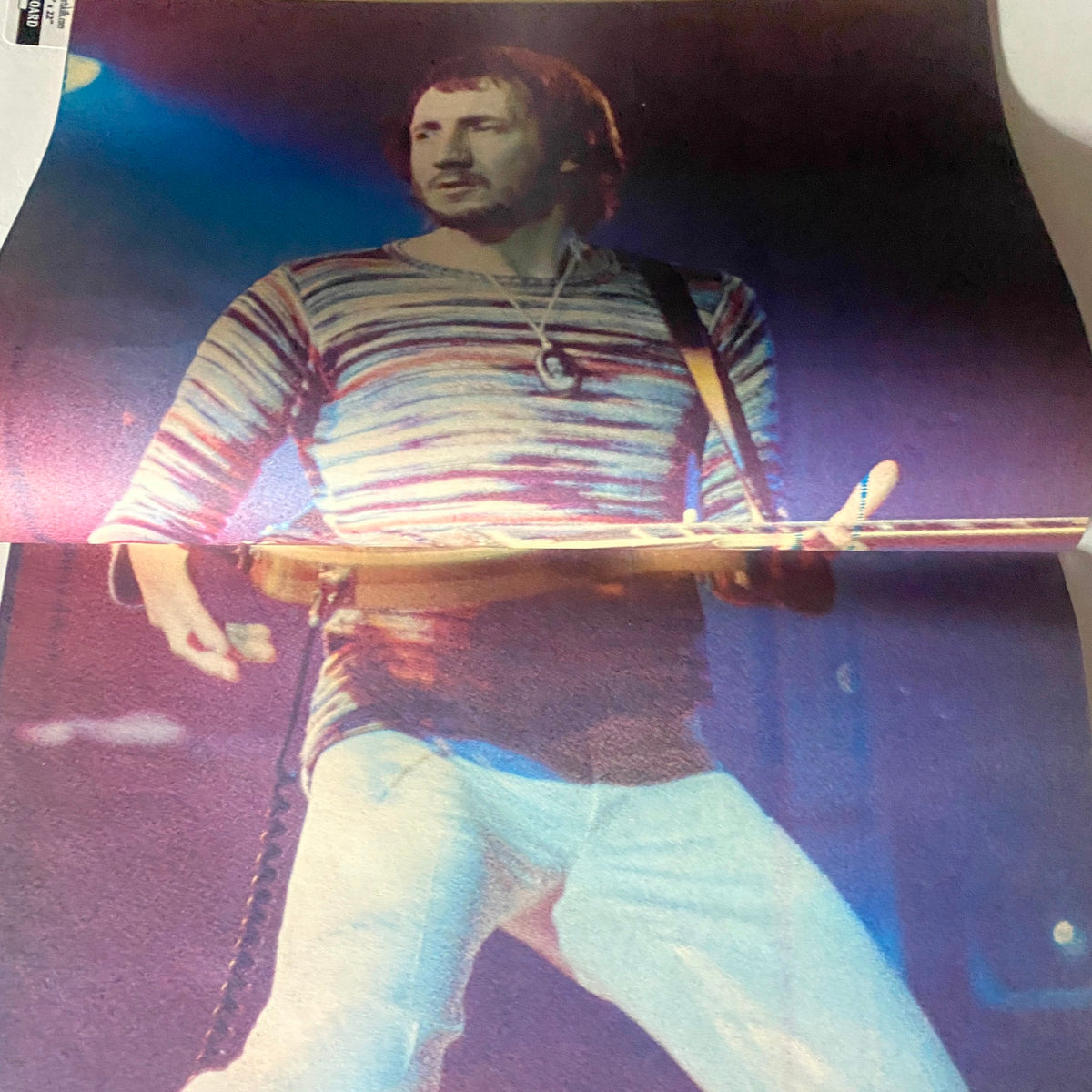 Centerfold in VTG Hit Parader Magazine April 1976 No. 141 featuring a stunning image of an artist on stage, highlighting the vibrant music culture of the 1970s.
