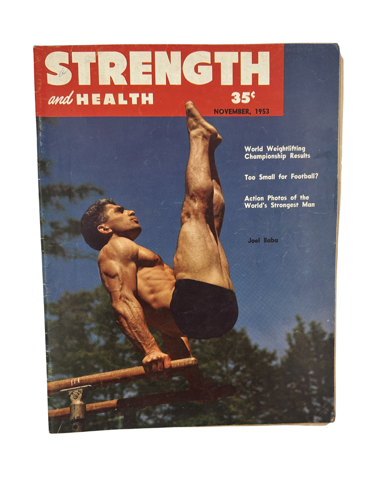Cover of Strength and Health Magazine November 1953 featuring Joel Baba, highlighting World Weightlifting Championship results and an article titled 'Too Small for Football?'.