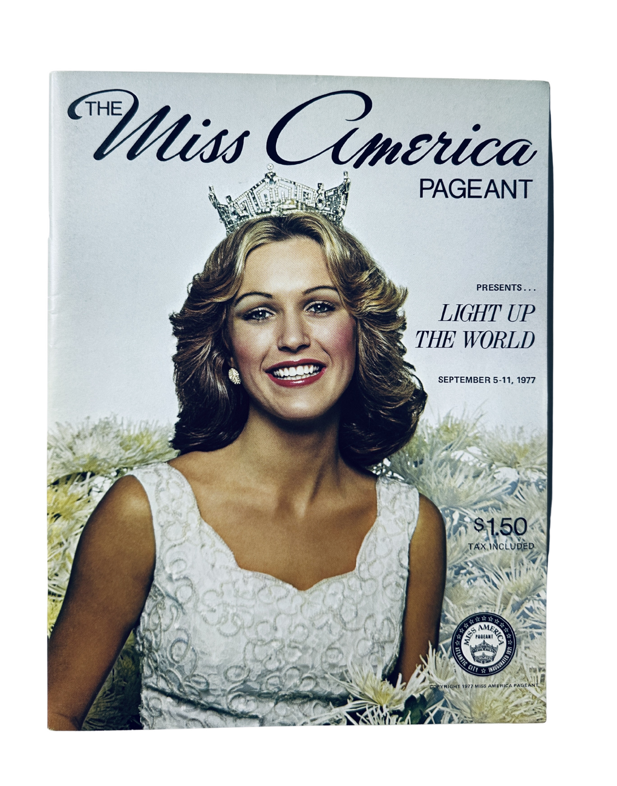 The Miss America Pageant Presents... Light Up the World magazine cover from September 5-11, 1977 featuring Dorothy Benham, Miss America 1977, adorned in a crown and elegant gown.