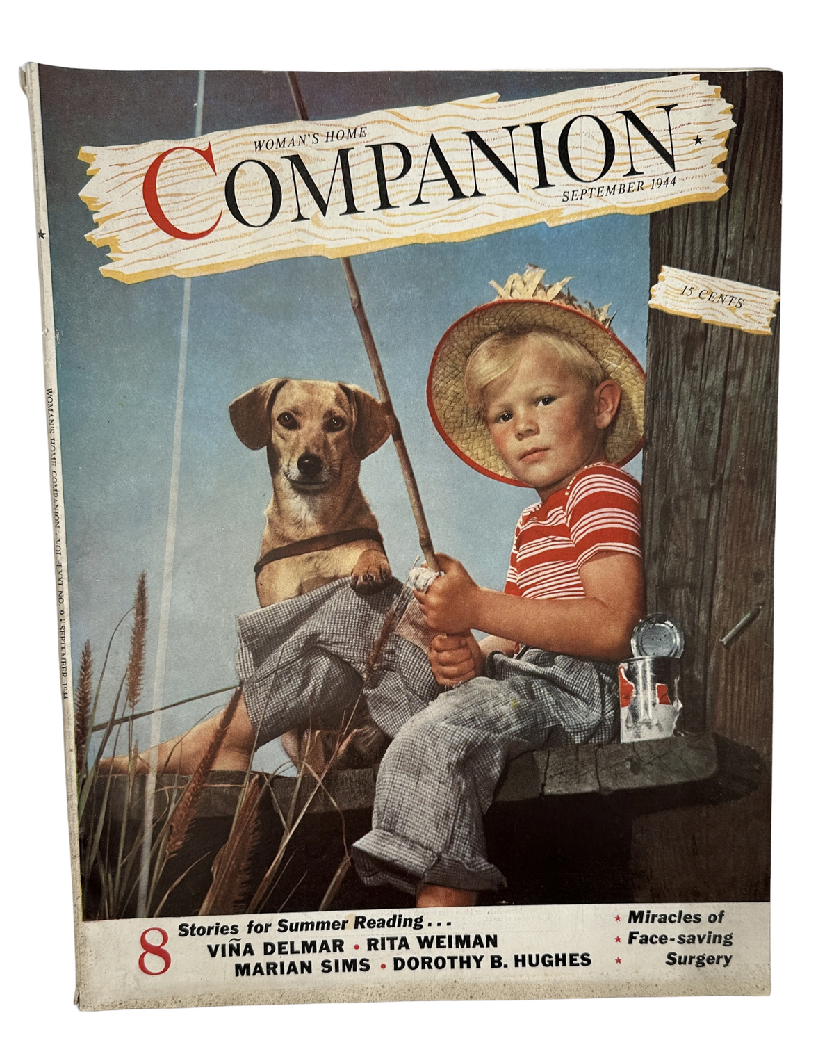Cover of Woman’s Home Companion Magazine September 1944 showcasing a young boy fishing with a dog, featuring articles on miracles of face-saving surgery.