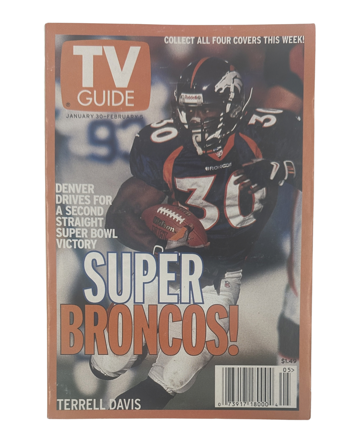 TV Guide Magazine cover from January 30, 1999 featuring Super Bowl coverage with Denver Broncos player Terrell Davis. The cover highlights the Broncos' second consecutive Super Bowl victory.