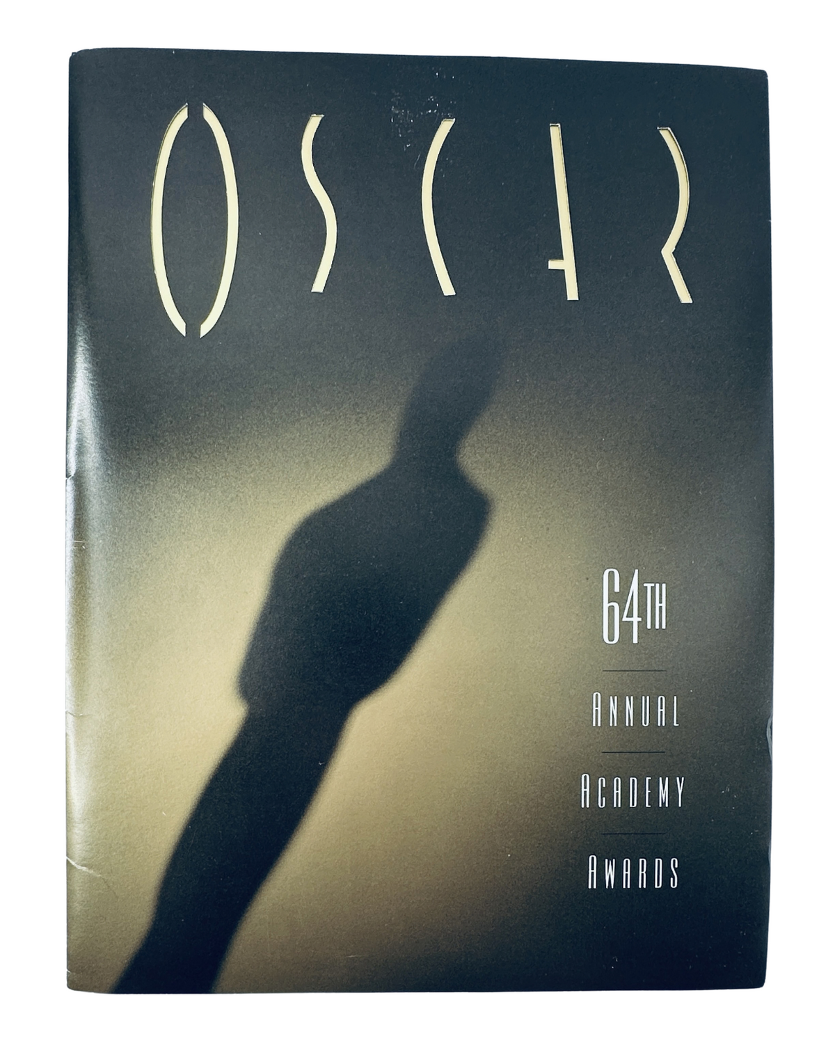 Cover of Oscar Magazine 64th Annual Academy Awards 1992 Program featuring a silhouette of an Oscar statuette.