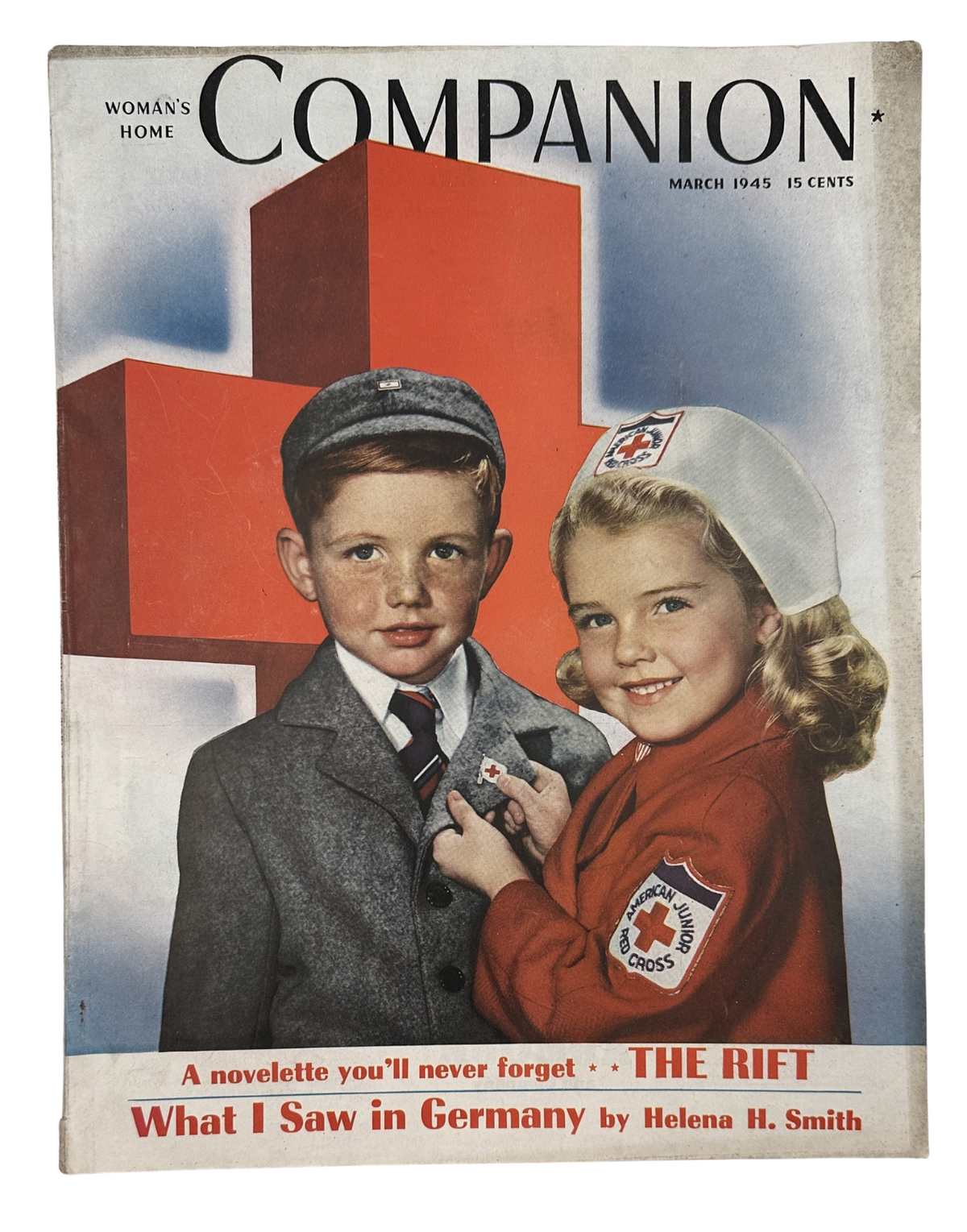 Cover of Woman’s Home Companion Magazine March 1945 featuring children in Red Cross attire with a red cross background, highlighting the novelette 'The Rift' and the article 'What I Saw in Germany' by Helena H. Smith.