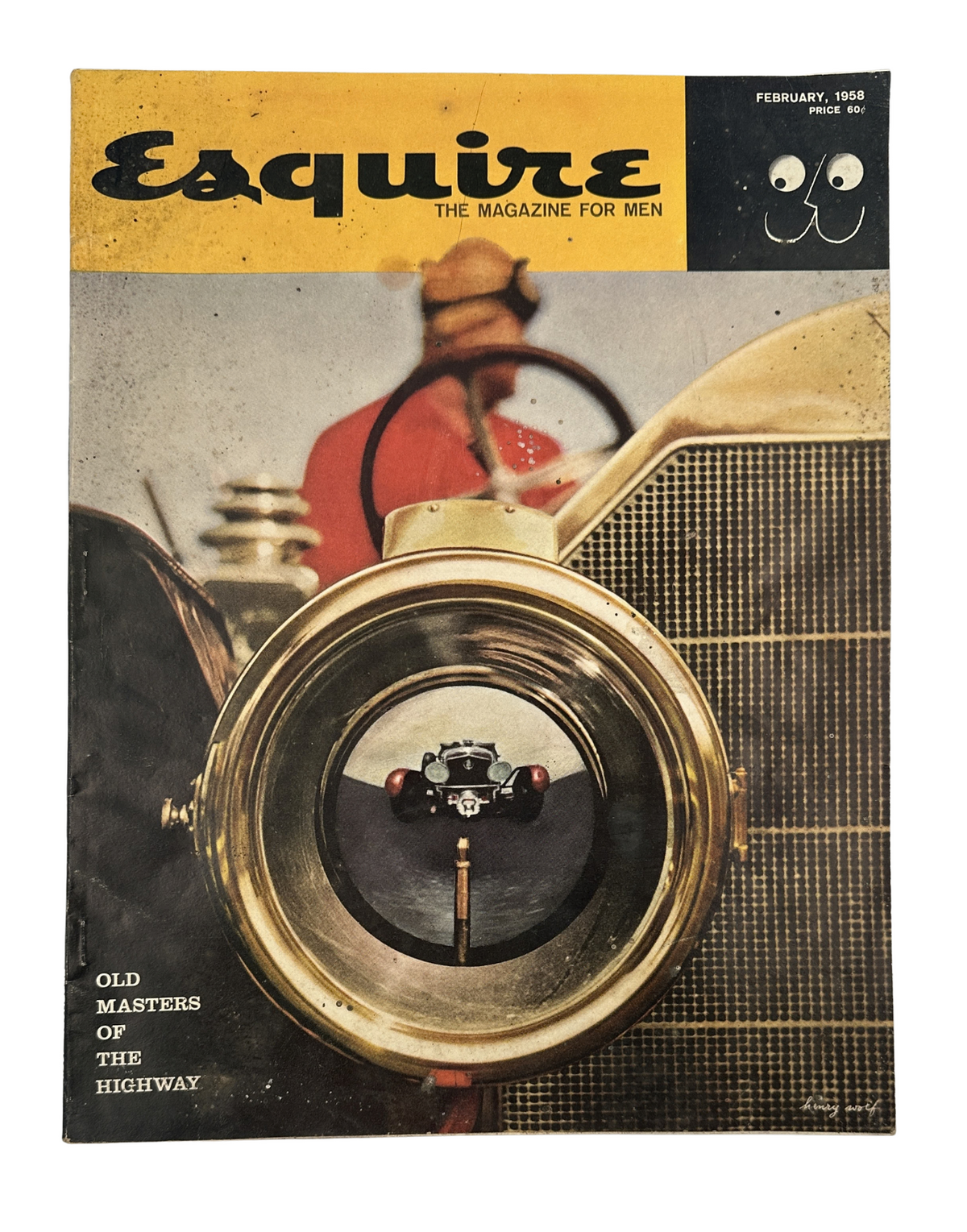 Esquire Magazine cover from February 1958 featuring a close-up photograph of a vintage car's headlight, showcasing the theme 'Old Masters of the Highway'.