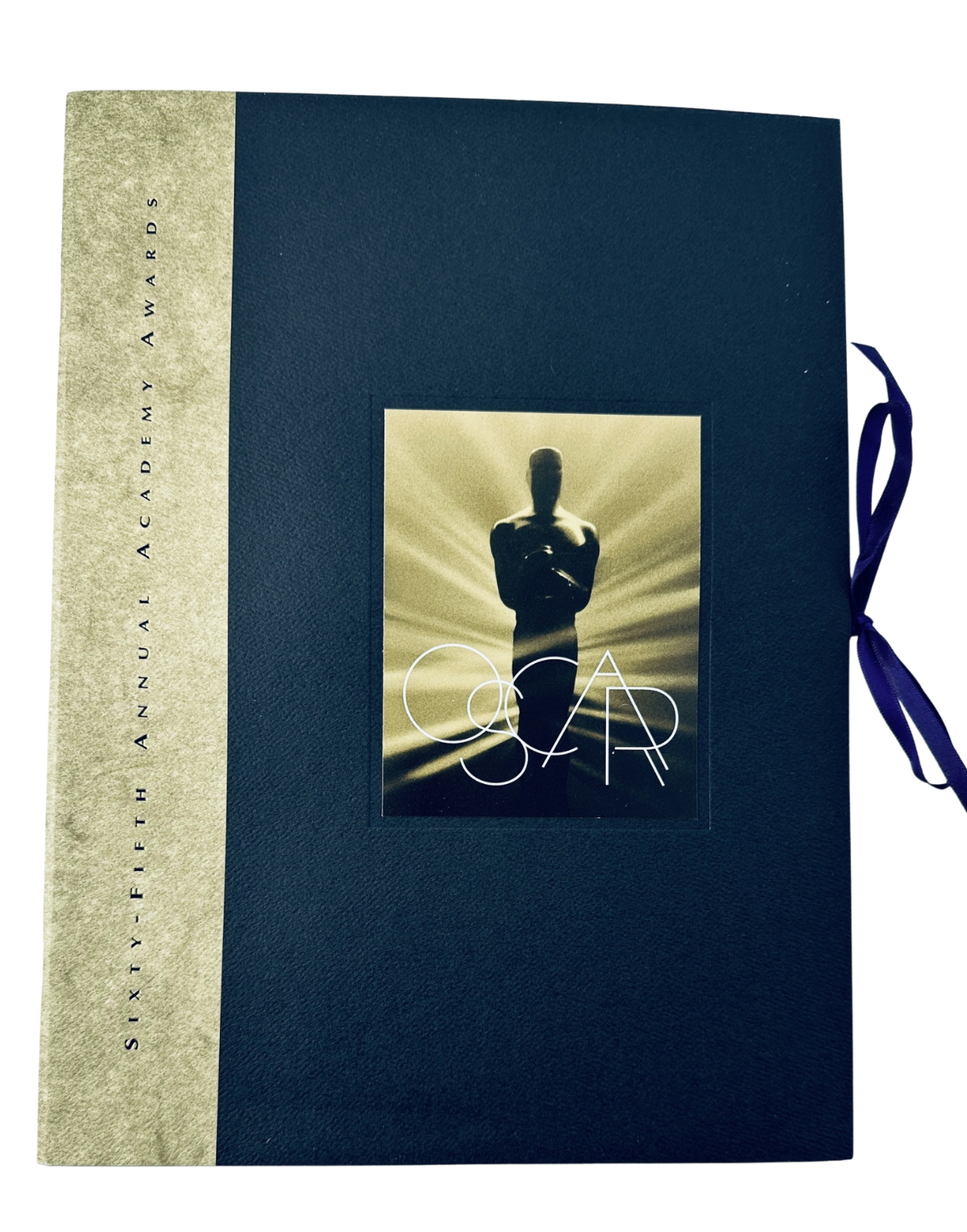 Oscar 65th Annual Academy Awards 1993 Program cover featuring a silhouette of an Oscar statue against a dark background, emphasizing the elegant design of the program.