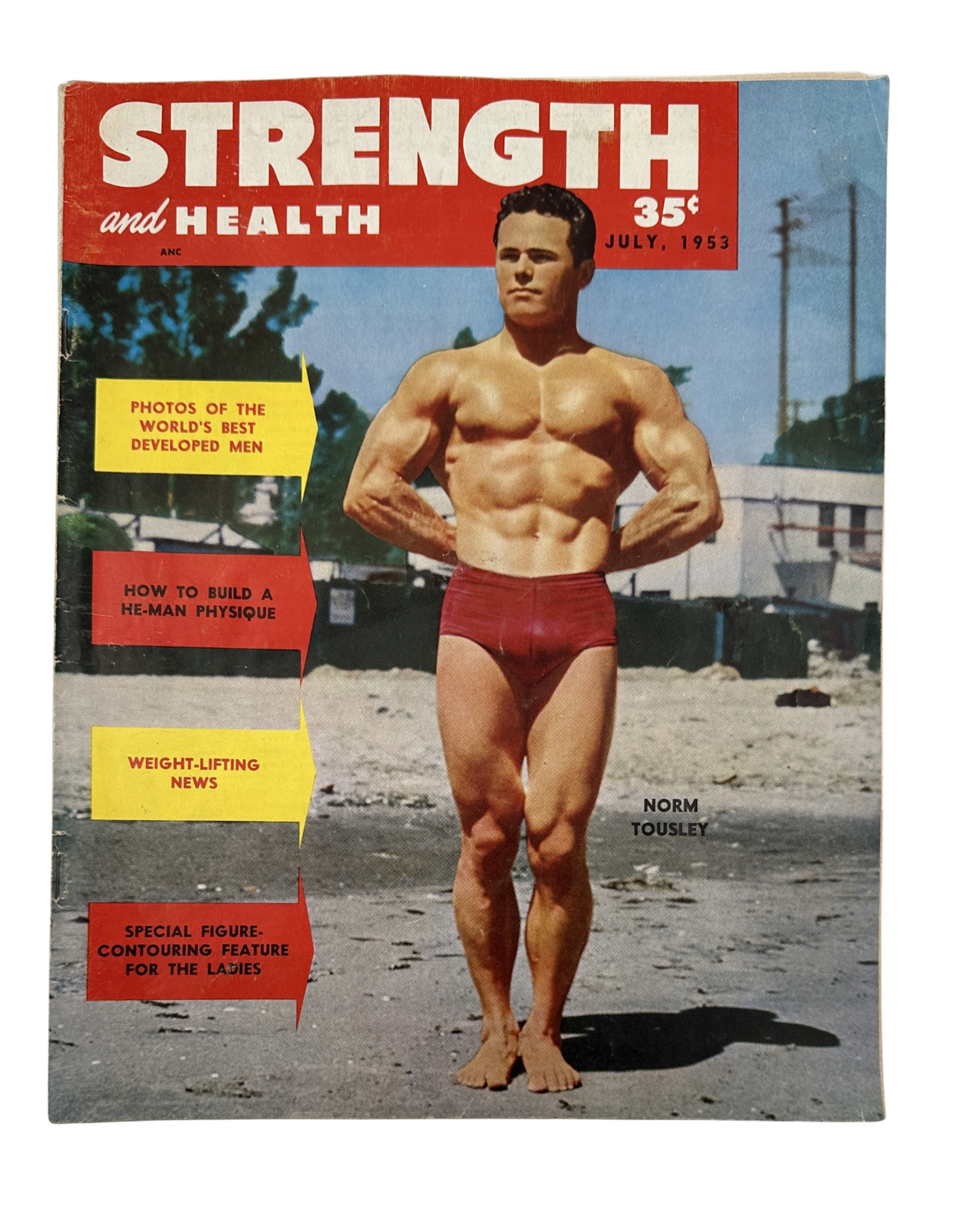 Cover of Strength and Health Magazine July 1953 featuring Norm Tousley showcasing a muscular physique, with tips on building a He-Man physique and weightlifting news.