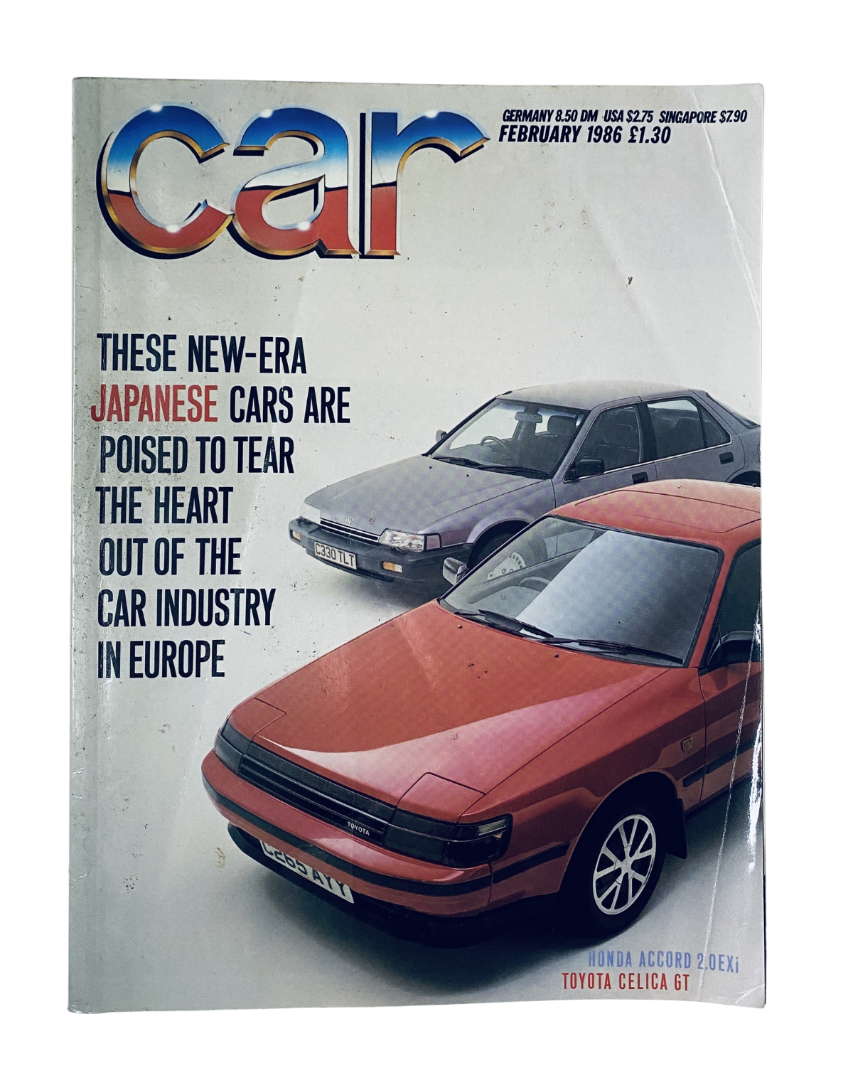 CAR Magazine February 1986 cover featuring Japanese cars, highlighting Honda Accord and Toyota Celica GT, showcasing the statement 'These new-era Japanese cars are poised to tear the heart out of the car industry in Europe.'