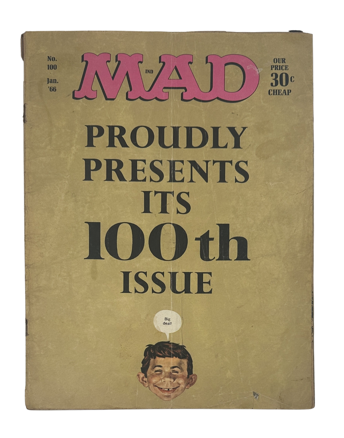 Cover of MAD Magazine No. 100 from January 1966, proudly presenting its 100th issue, featuring a cartoonish face of a boy on a brown background.
