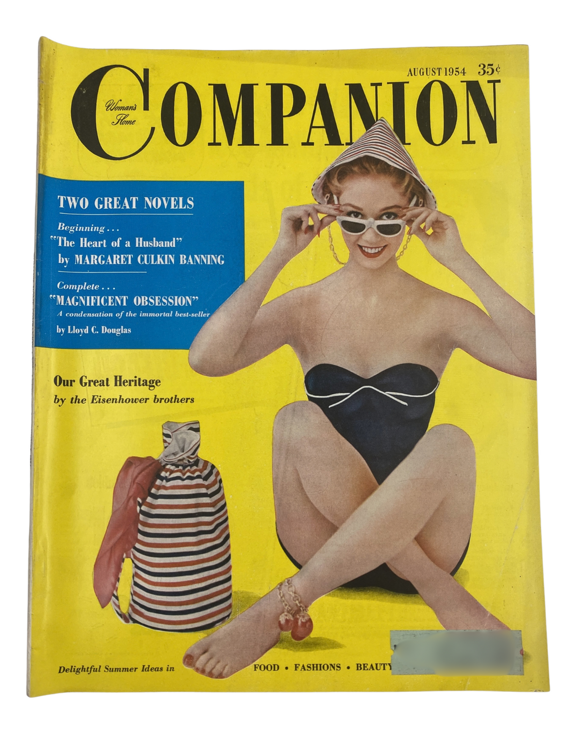 Woman’s Home Companion Magazine August 1954 featuring a vibrant fashion cover with a model in a swimwear pose, showcasing summer styles and colors from the 1950s, reflecting the era’s fashion trends.