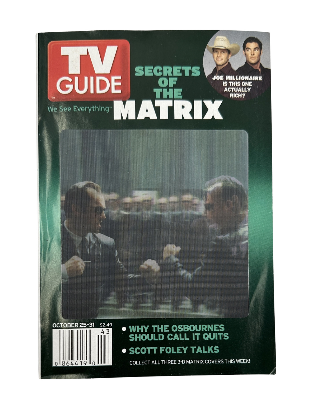 TV Guide Magazine cover from October 25, 2003 featuring the title 'TV Guide: Secrets of the Matrix' with a focus on the Matrix trilogy and Scott Foley, showcasing the cover design and colors.