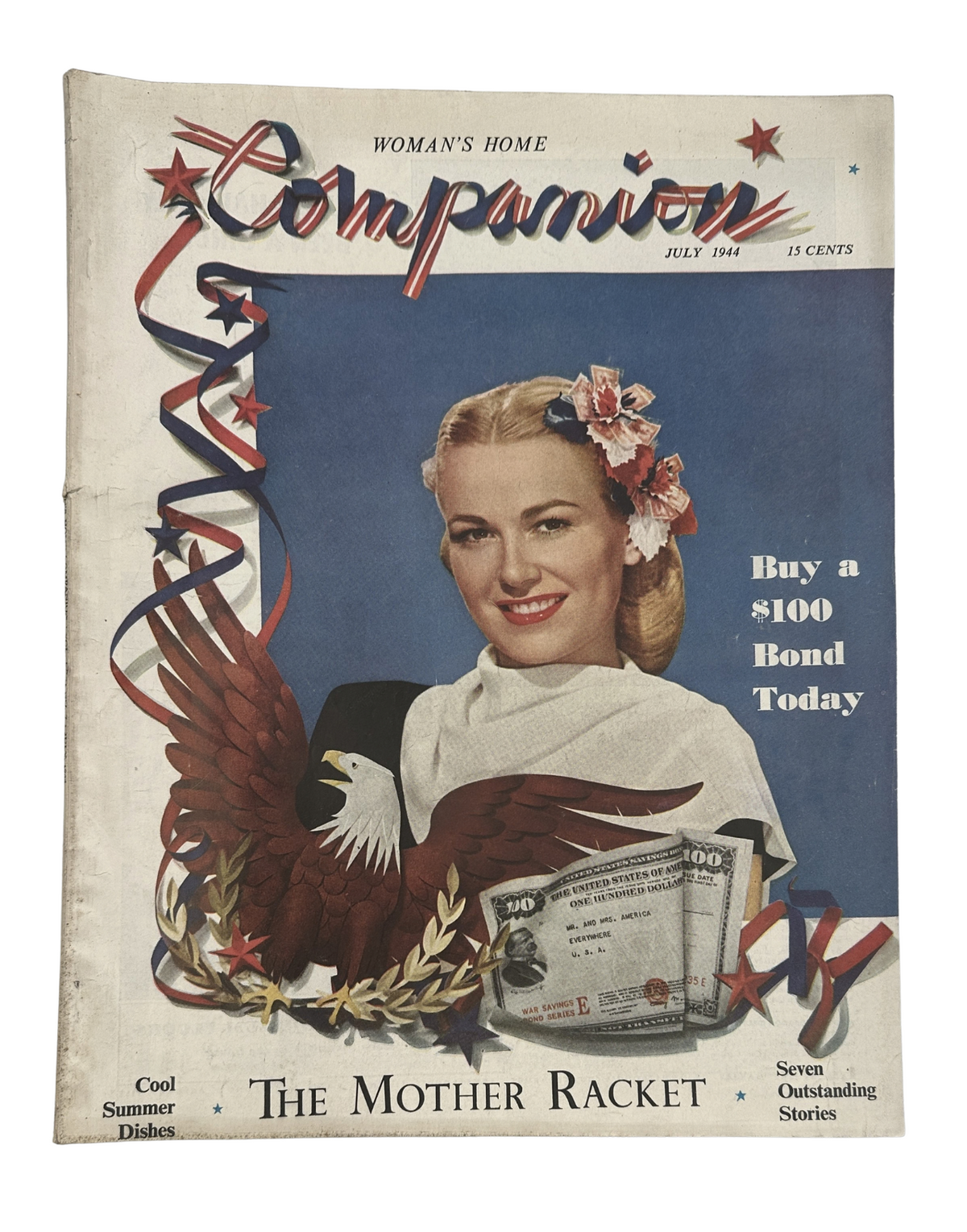Cover of Woman’s Home Companion Magazine July 1944 featuring Bette Jane Hess with an eagle and a $100 bond advertisement, promoting the theme 'The Mother Racket'.